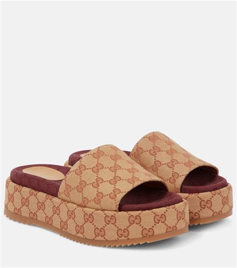 women gucci original gg canvas slides|Gucci slides with fur women.